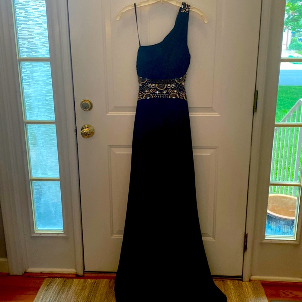 Prom/formal gown with black, gold and diamond colored sequins.